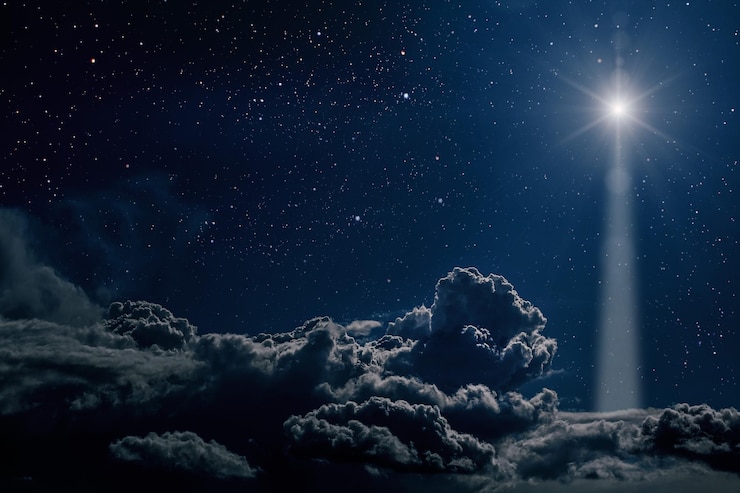Photo the star shines over the manger of christmas of jesus christ.