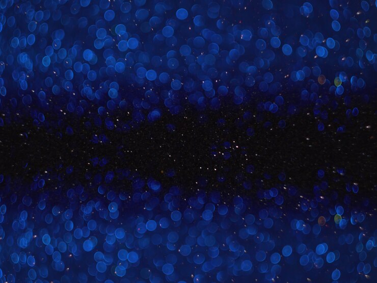 Star sky and blue bokeh background, abstract with defocused lights.
