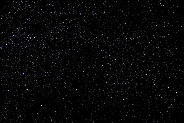 Foto sfondo di cielo stellato con stelle luminose nel cielo notturno scuro