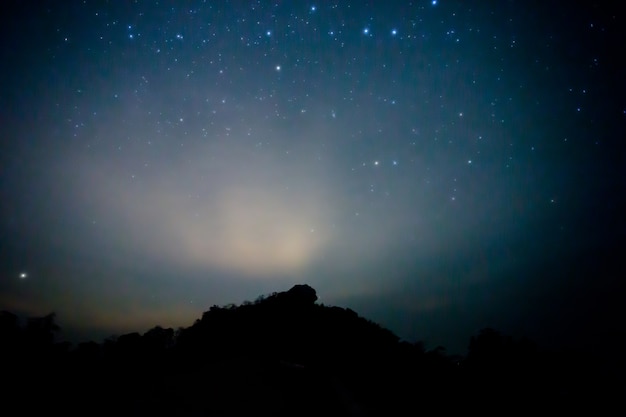 Starry sky and mountain. High level of noise