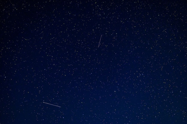 Starry sky with many stars and the Milky Way. Astrophotography of the cosmos with galaxies