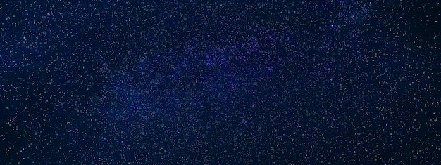 Stars on background of the night starry sky milky way galaxies\
and universes on a dark blue background