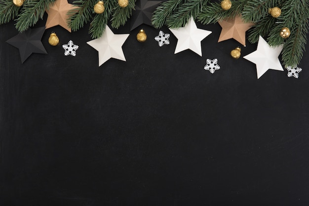 Stars and Christmas ornaments, border design, on backboard 