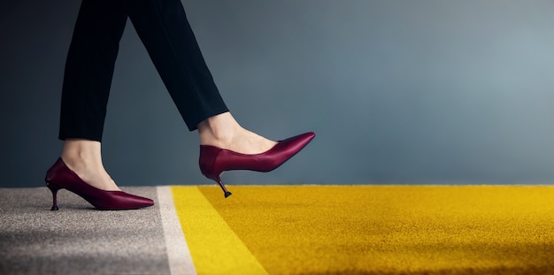 Start Concept. Low Section of Business Woman Steps into Start Line for Moving Forward to New Challenge. Cropped Image. Side View. Business Strategy, Metaphor Conceptual