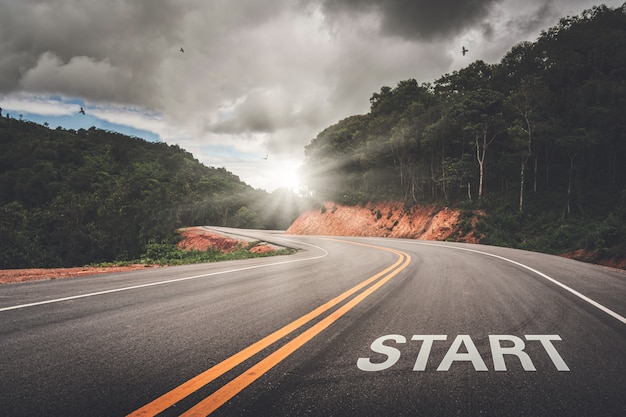 Photo start point on the road of business or your life success. the beginning to victory.