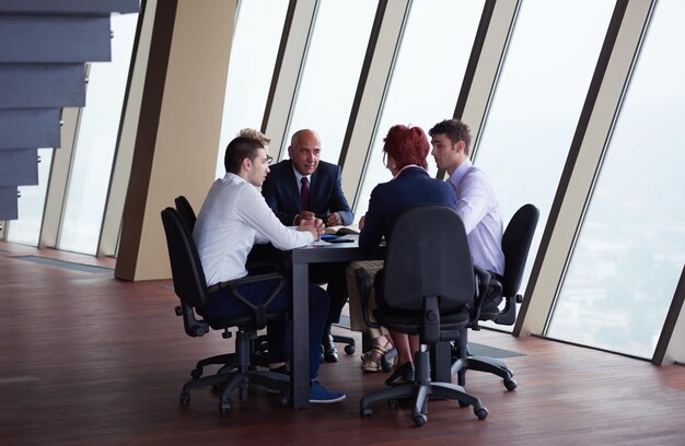 startup business people group have meeting in modern bright office interior, senoir investors  and young software  developers