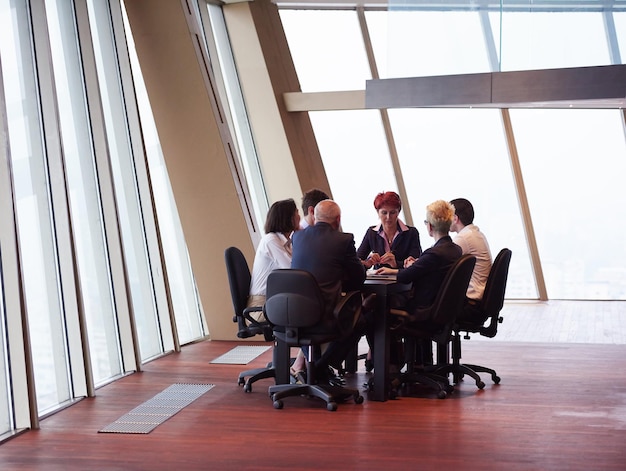 startup business people group have meeting in modern bright office interior, senoir investors  and young software  developers