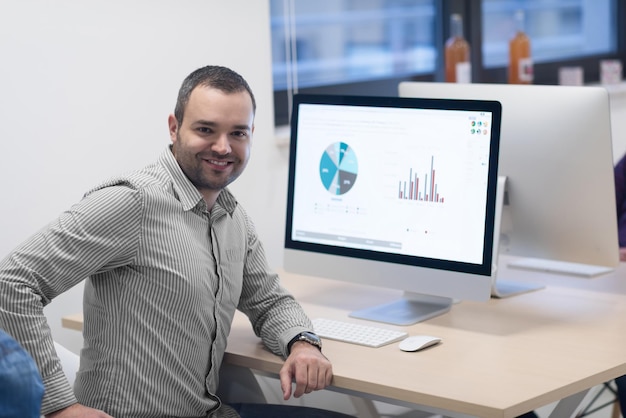 startup business, software developer working on computer at modern office