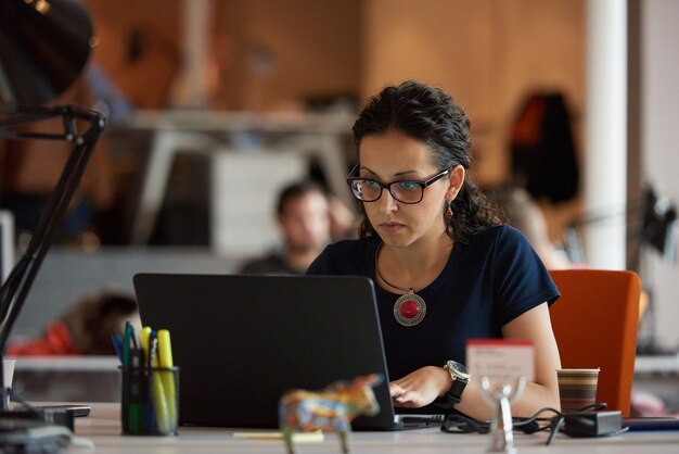 startup business, woman  working on laptop computer at modern office