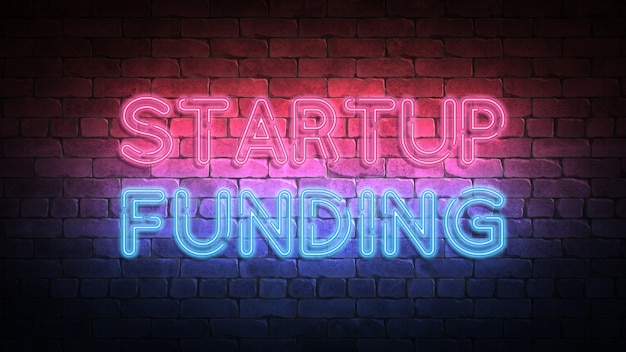 Photo startup funding neon sign on a wall