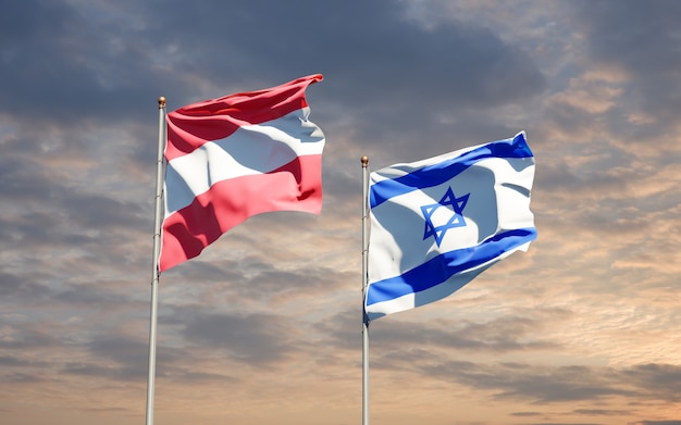 state flags of Israel and Austria together at the sky background