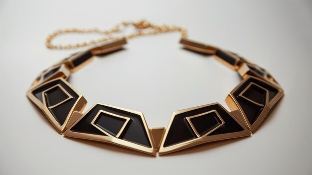 A statement necklace with a bold geometric design made from shiny gold metal and black enamel