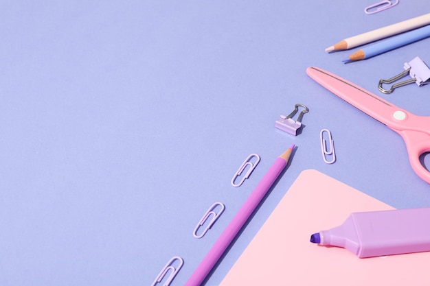 Stationary on colorful background flat lay composition