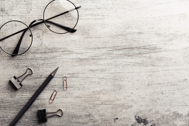 Stationary on wooden background