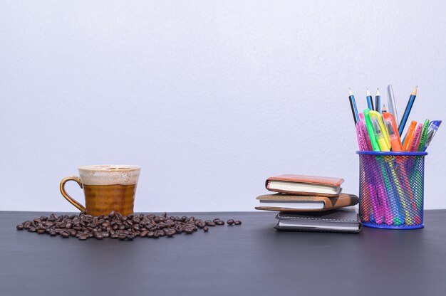 Stationery and coffee on the desk