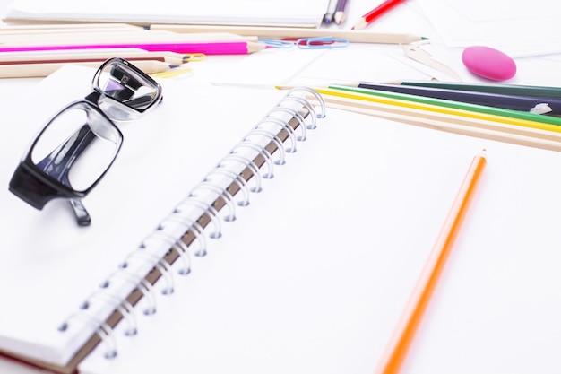 Stationery and glasses closeup