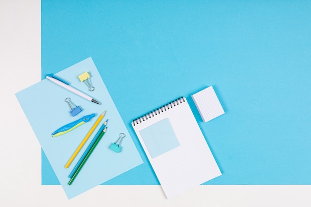 Stationery isolated on blue and white