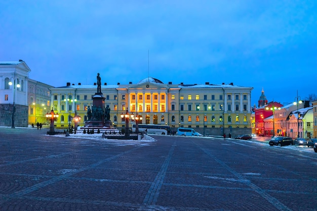 Statue of Alexander at Government Palace on Senate Square in the center of Helsinki, Finland in winter in the evening