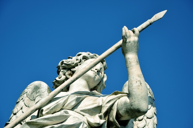 Statue of angel holding the holy lance