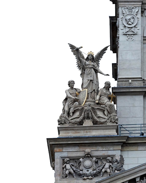 A statue of an angel with a shield on the top of it