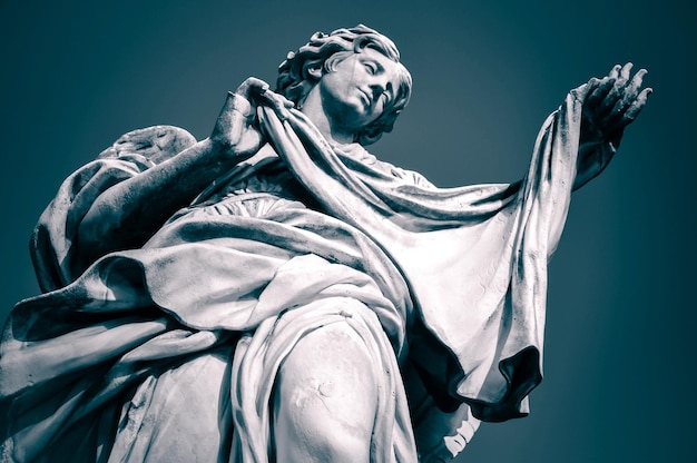 Statue of Angel with the Sudarium Veronica's Veil Ponte Sant' Angelo Rome Italy Toned image