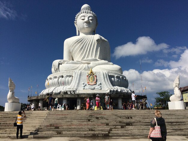 Statue of buddha against sky