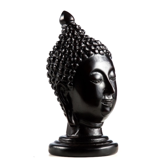 Statue of Buddha head black isolated white background