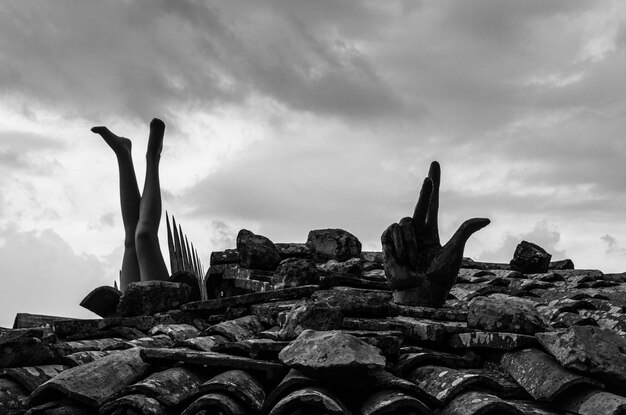 Statue of cactus against sky