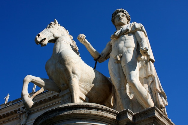 Statue of Castor with a horse in front of the Capitol Square Rome Italy