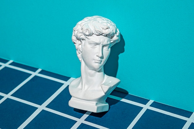 Statue of David39s head in digital cyberspace Minimal concept of online technologies and modern art and cyberpunk