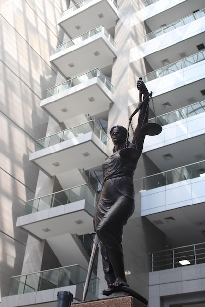 Statue of a female judge representing justice and law inside the courthouse