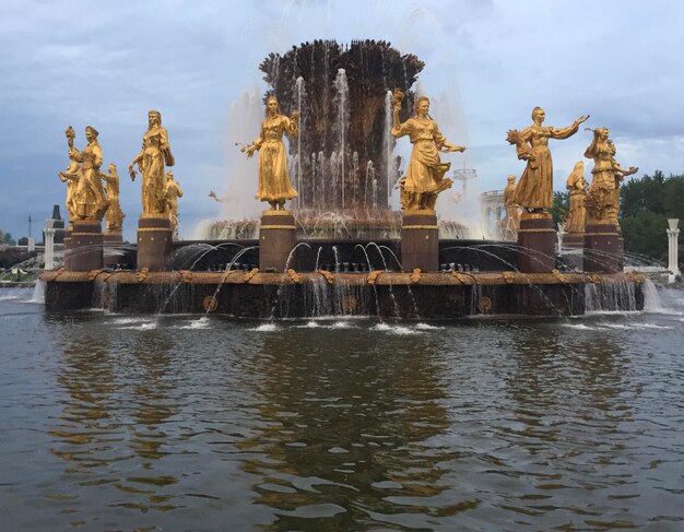 Statue of fountain in water