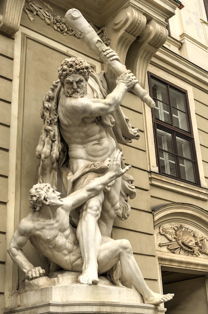 Statue of Hercules outside the Hofburg Palace in Vienna Austria showing how he fulfills the legendary Labors of Hercules