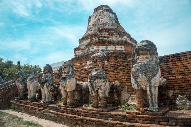 Statue of historic temple against sky