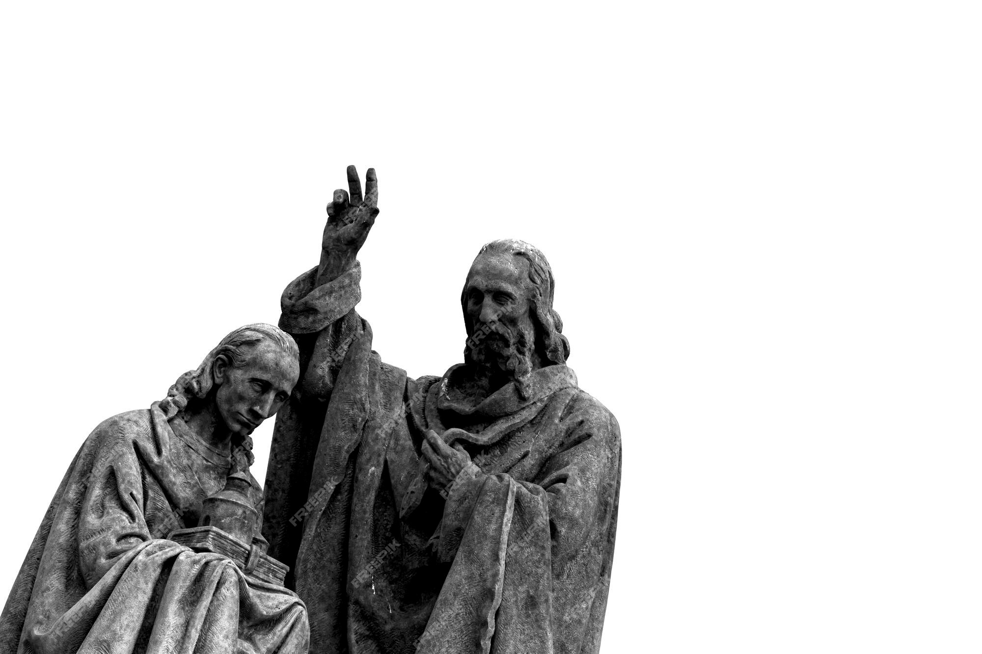 Premium Photo | A statue of jesus and a woman with the hand up in the air.