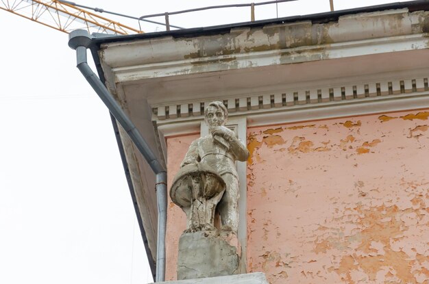 A statue of a man on a pedestal