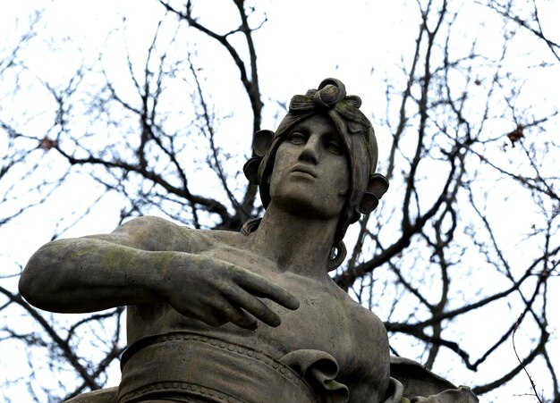 A statue of a man with a helmet on it