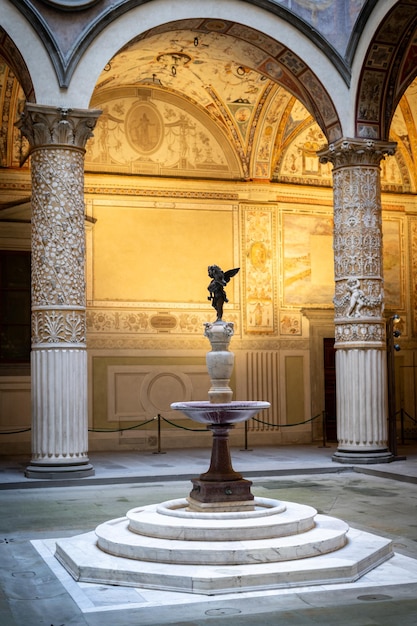 Statue in the middle of historical atrium palazzo vecchio florence italy europe