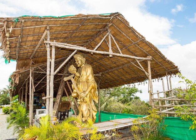 Photo statue near big buddha monument phuket thailand thai style statues acting wai or sawasdee