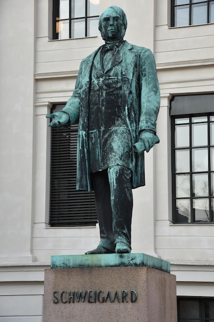 Photo statue of the norwegian educator, jurist, economist and statesman anton martin schweigaard - oslo