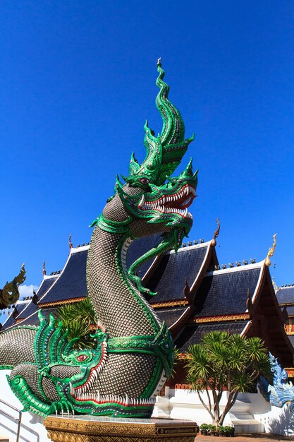 Statue of temple against clear blue sky