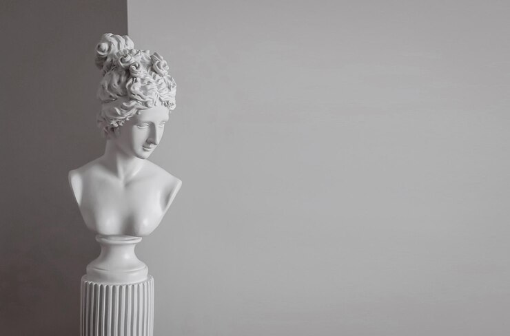 Photo a statue of a woman with a hairdo on it