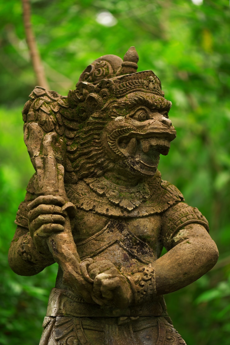 फोटो statues and carvings depicting demons, gods and balinese mythological deities.