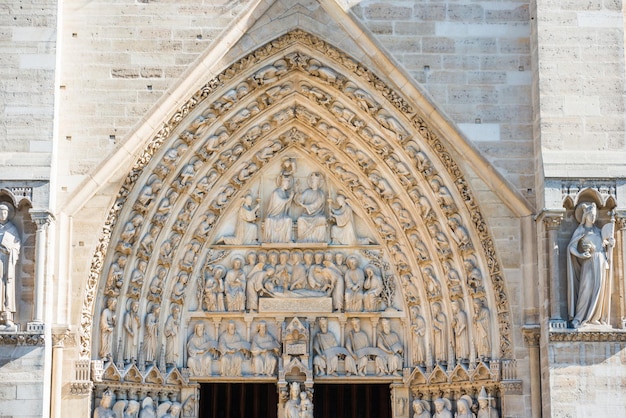 Statues on entrance arch of cathedral Notre-Dame de Paris. Paris, France before fire April 15, 2019. Paris, France