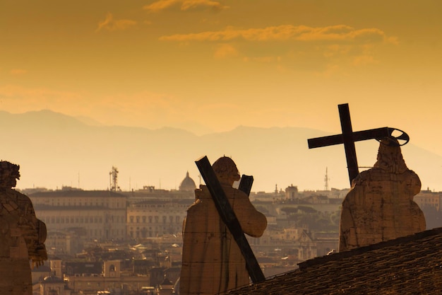 Statues on top of St Peter's Basilica in Rome including Christ the Redeemer