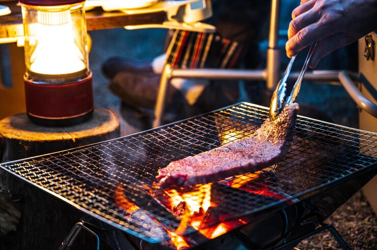 Photo キャンプで焼くステーキ