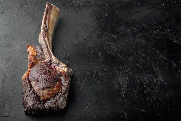 Steak on the bone. tomahawk steak freshly grilled dry aged BBQ food set