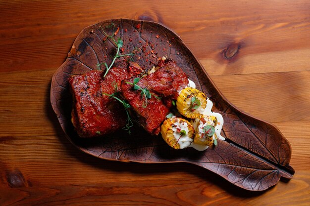 Steak grilled with corn and herbs