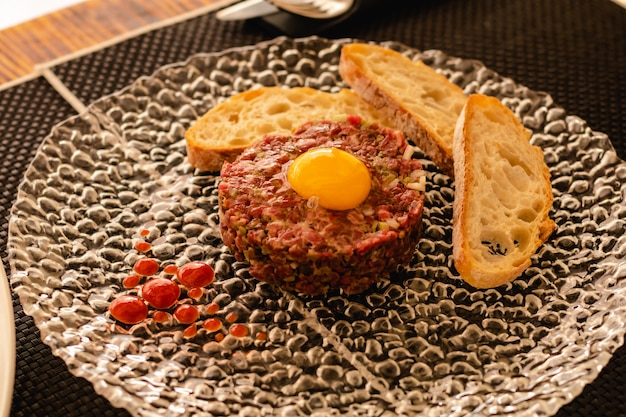 Steak tartar of old cow sirloin with 40 days of maturation on restaurant