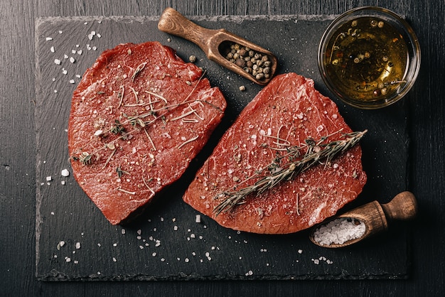 Steaks on a table top dinner concept